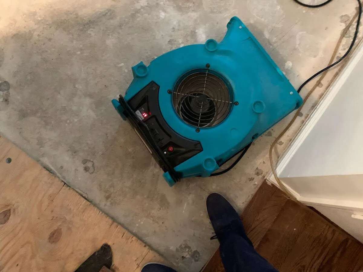 Air mover drying subfloor during Leak Detection & Repair in Rock Hill