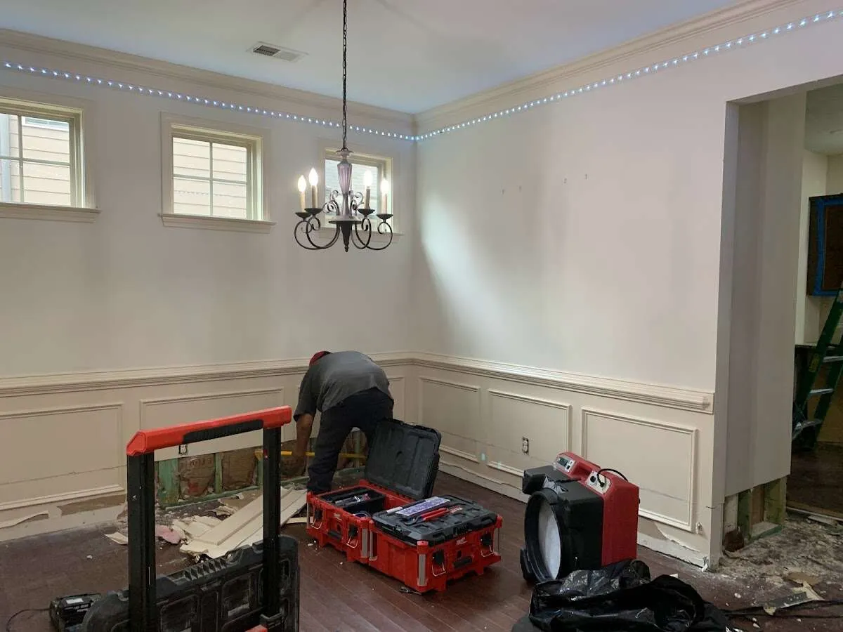 Restoration technician with professional equipment in Rock Hill